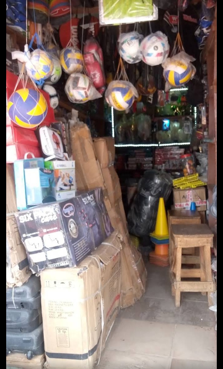 Inside Ejyke Sports Store in Kano, stocked with balls and fitness equipment